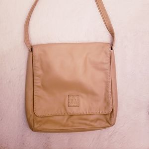 Lauren Ralph Lauren nude purse.